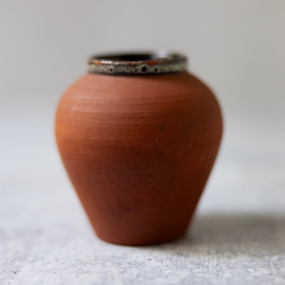 Small mini pottery jar urn mostly unglazed clay Plum Denmark? 2.5 inches tall